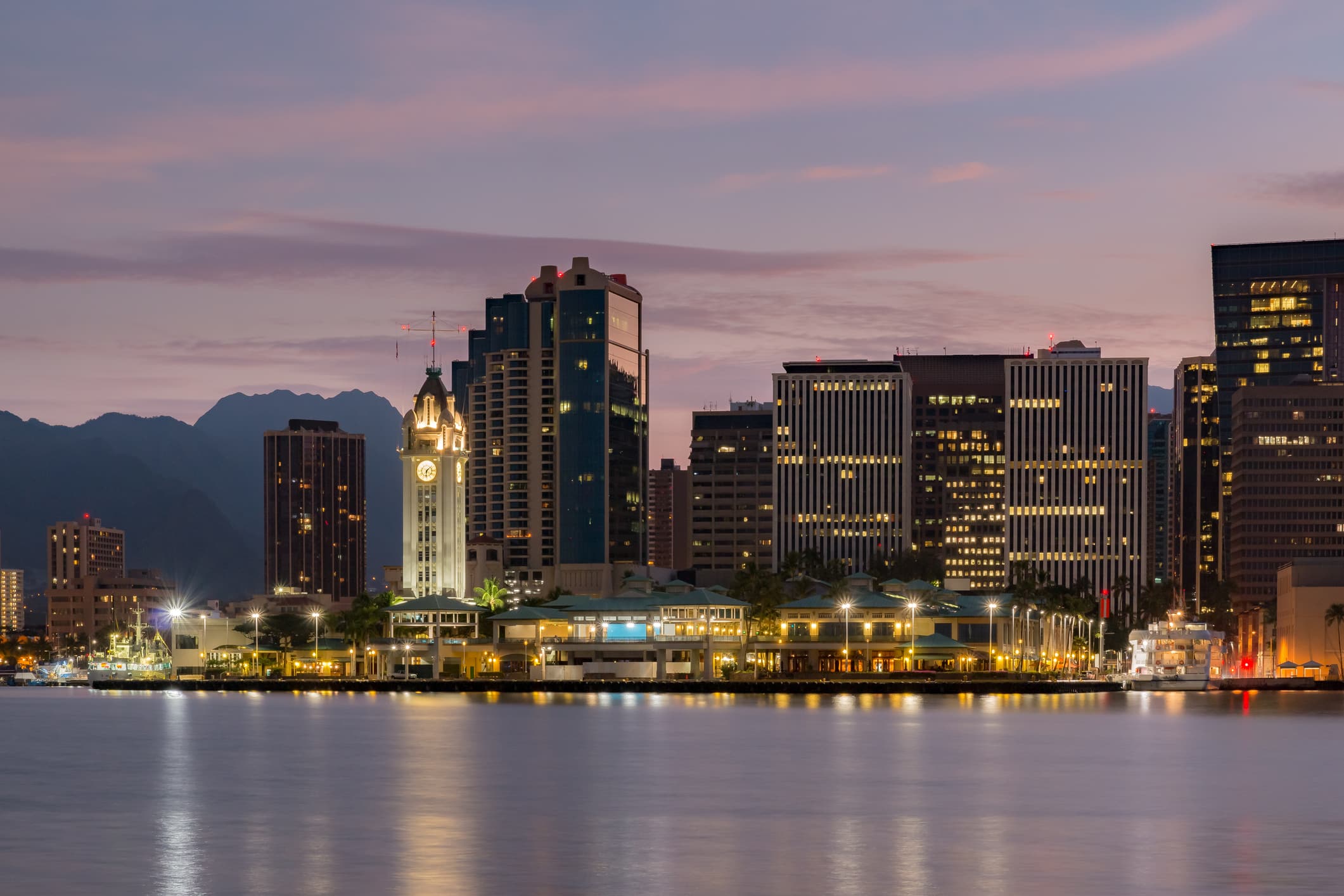 Downtown Honolulu and Aloha Tower across Honolulu Harbor on Oahu Hawaii
